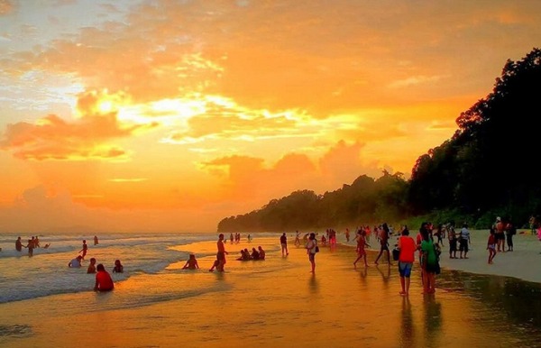 Sunset at Havelock Island with visitors enjoying the beach – best island in Andaman for golden hour views